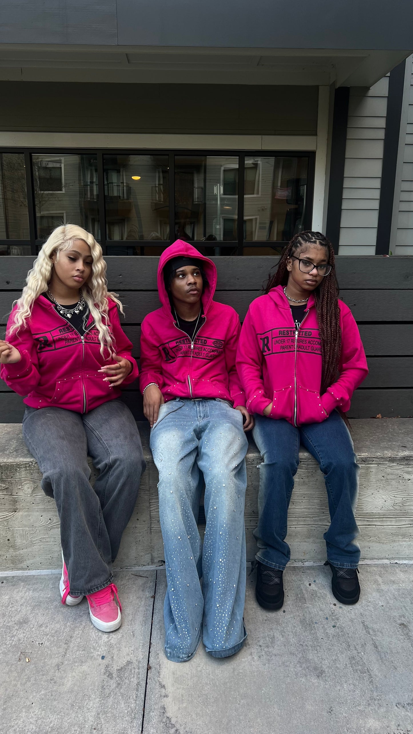 Restricted pink zip up